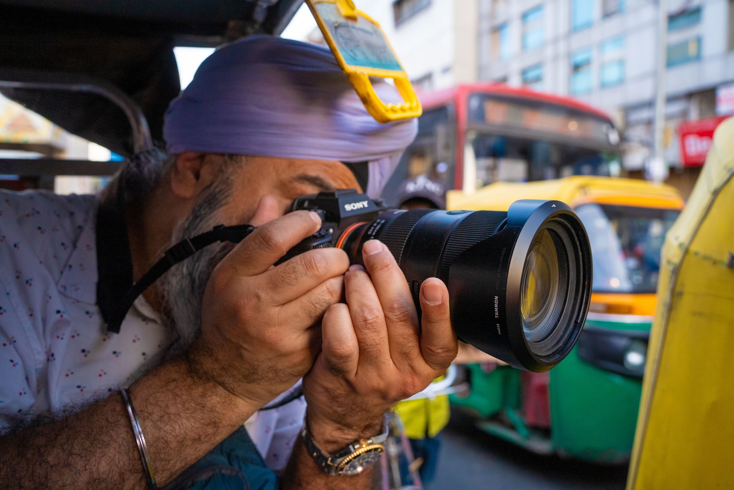 Harpreet Singh on a three-wheeler in Delhi